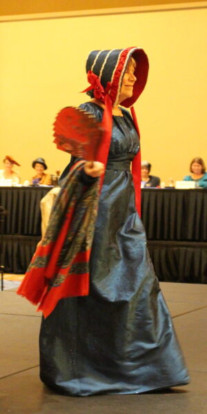 Owlyn Coughlin wearing a Loyalist dress of the late 1700s