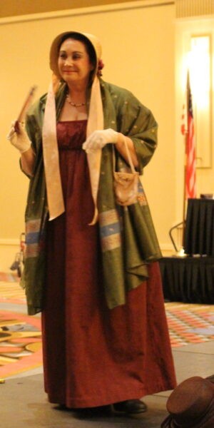 Suzanne Cyr wearing a Loyalist dress of the late 1700s