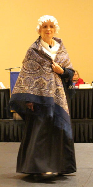Cindy Bissonnette wearing an early 1800s dress