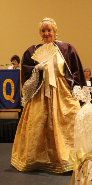 Pearl Roberts wearing a Victorian dress from the late 1800s